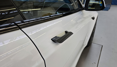 Warnung vor versenkbaren Türgriffen